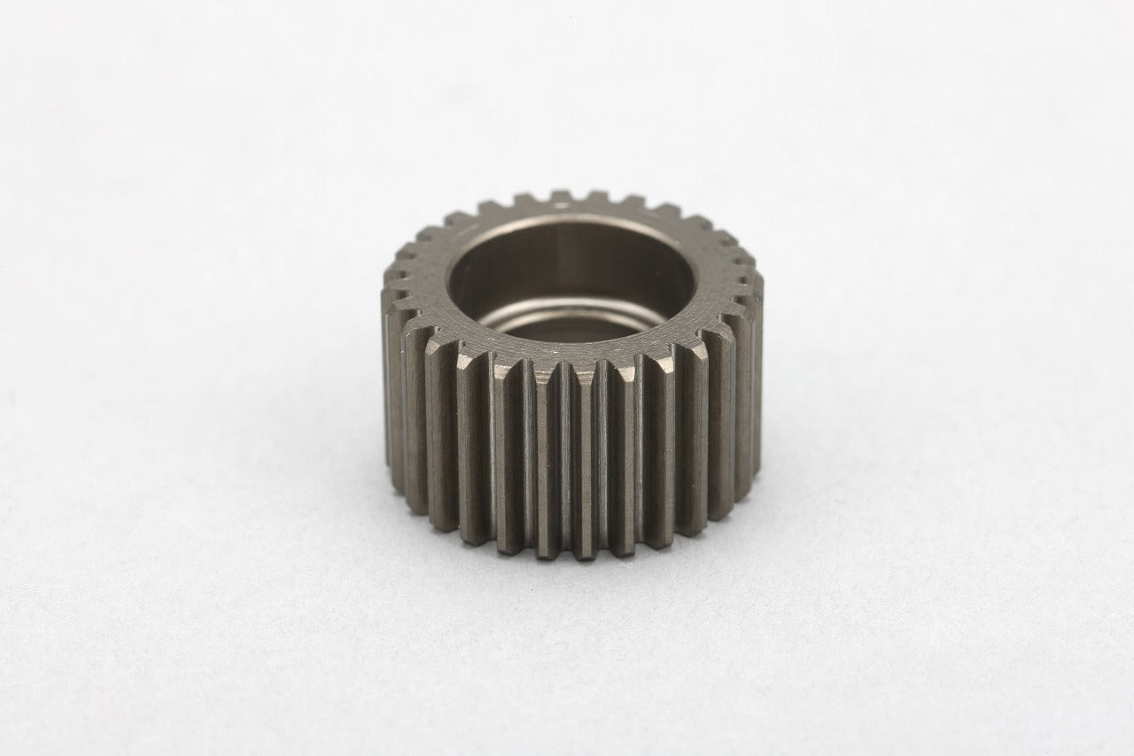A Alm.Idler Gear for YD-2 from Yokomo on a white background