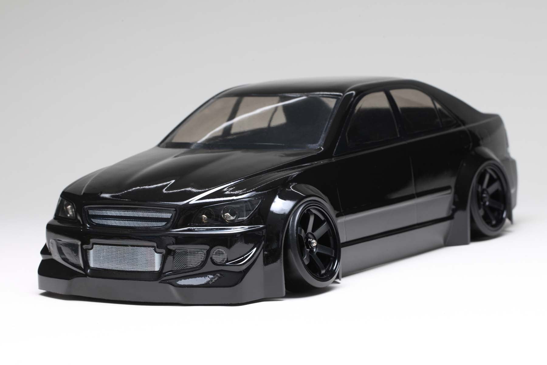 Front side view of a fully built IS220 Altezza Body w/Light Decal by Yokomo on a white background