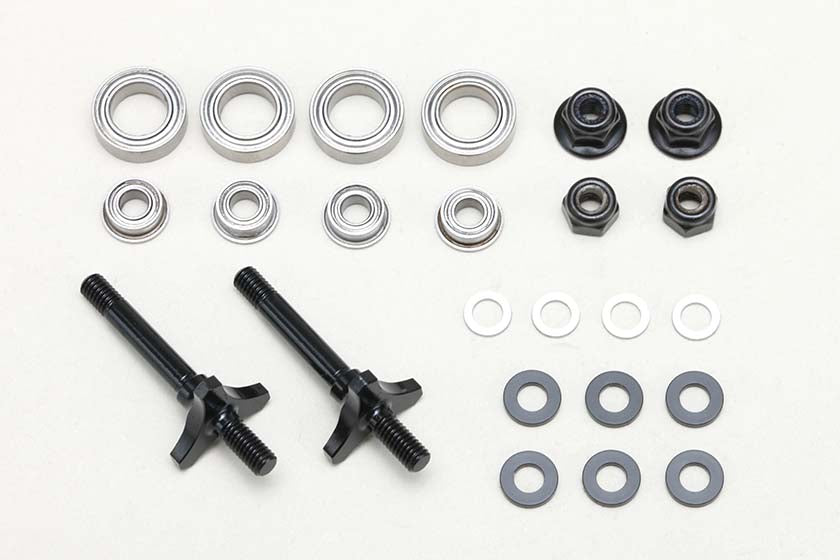 All of the parts of the Steel Double Bearing F.Axle Set for RD/SD/MDs including bolts, washers, and bearings on a white background
