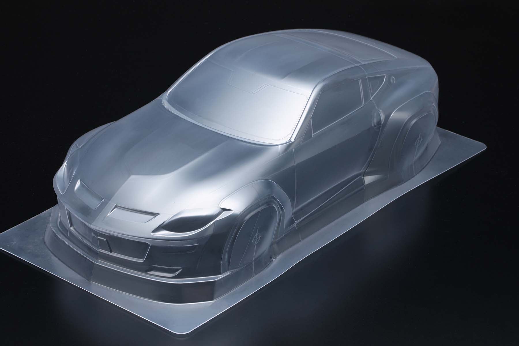 front of the Yokomo PANDEM NISSAN FAIRLADY Z RZ34 Body mold on a black background